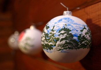 Christmas decorations, glass balls, hanging on the wall before New Year Day