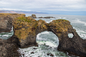 Rock bridge in the sea in Iceland