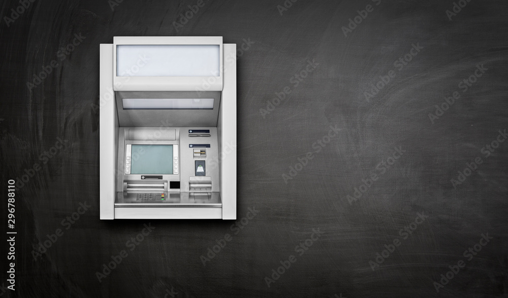 Wall mural atm machine on black background