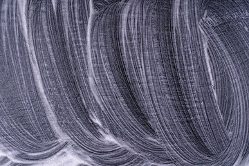 Abstract foam texture on black background. Soap foam bubbles abstract dark background