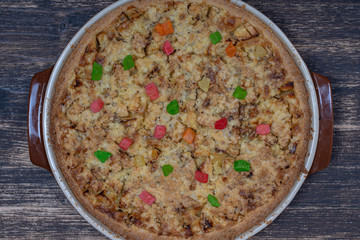Homemade organic apple pie dessert ready to eat, close up. Apple tart with walnut. Close up
