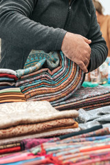 Traditional Indian fabric store. Colorful traditional indian hindi textile fabric wrap scarfs