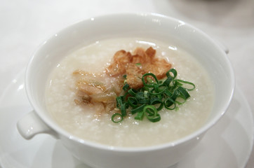Chinese white porridge in white bowl