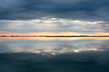 Fototapeta na wymiar sunset over a lake