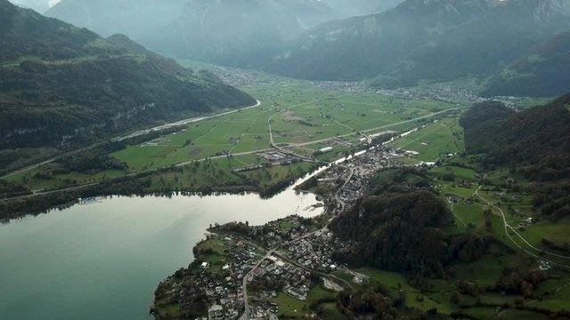 Fantasy aerial view of Walensee and Weesen village in See-Gaster in the canton of St. Gallen, Switzerland.