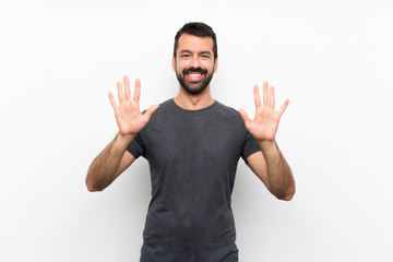 Young handsome man over isolated white background counting ten with fingers