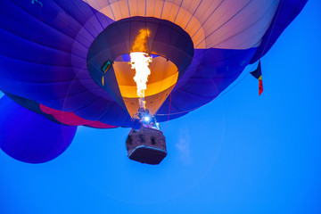 Flame into hot air balloon