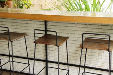 Set chairs of vintage style in garden
