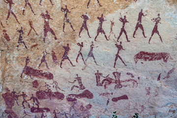 San bushman rock painting of a large group of people