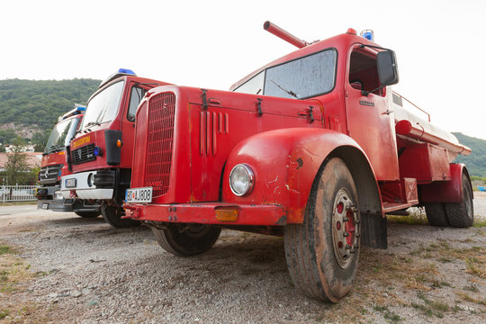 PETROVAC, MONTENEGRO - JULY 05, 2013: Photo of red firefighters truck based on FAP1314. FAP is a Serbian automotive manufacturer of trucks and buses founded in 1952