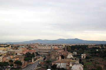 Fototapeta premium View of Colosseum and Roman Forum in Rome, Ilaly from monument of Vittorio Emanuele Vittoriano observation deck. Rome cityscape from viewpoint. Travel photography.