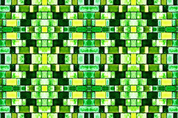 abstract background, kaleidoscope, textured mosaic of colored tiles, sidewalk of colored tiles. Street decorative tiles with geometric pattern. green, yellow background top view.
