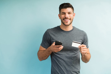 Smiling Attractive Man Making Online Payment