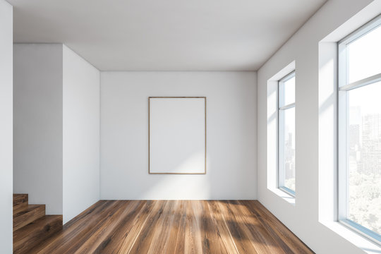 Empty white living room with poster