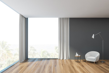 Gray living room with white armchair