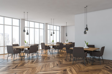 White stylish cafe corner with armchairs