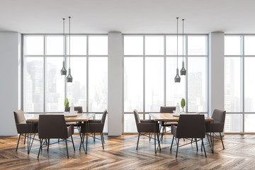 White panoramic restaurant interior with armchairs