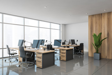 Fototapeta White and wooden open space office corner obraz