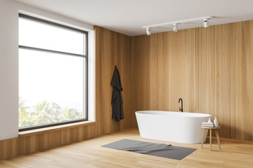 Fototapeta na wymiar White and wooden bathroom corner with tub