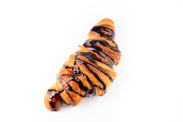 hot croissant with chocolate on white background