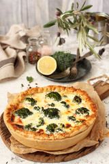French pie -traditional open pie with salmon, broccoli, egg, cheese and sour cream.