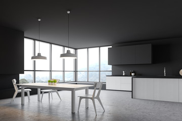 Gray and white kitchen corner with table