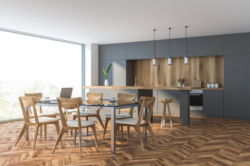Wooden floor kitchen corner with table