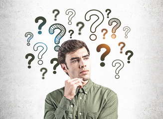 Thoughtful young man and his questions