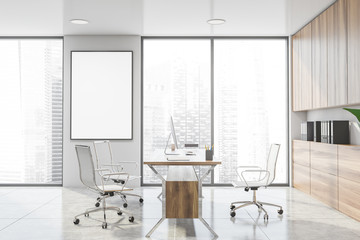 White and wooden CEO office with poster