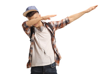 Young guy gesturing a dub move - obrazy, fototapety, plakaty
