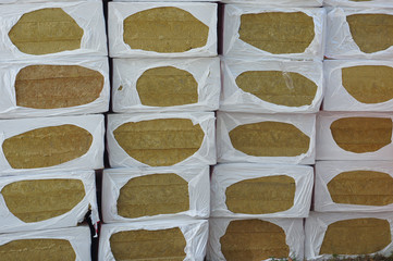  packs with mineral wool slabs to insulate buildings, stacked on top of each other