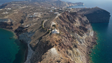 Aerial drone photo of iconic lighthouse of Akrotiri near Akrotiri village, Santorini island,...