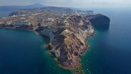 Aerial drone photo of iconic lighthouse of Akrotiri near Akrotiri village, Santorini island, Cyclades, Greece