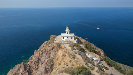 Fototapeta na wymiar Aerial drone photo of iconic lighthouse of Akrotiri near Akrotiri village, Santorini island, Cyclades, Greece
