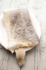 Slice of raw salted codfish