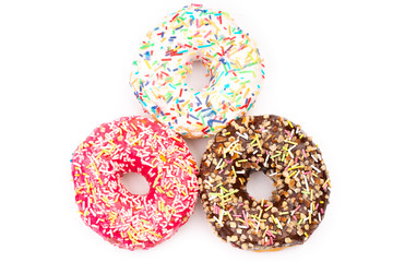 Delicious sweet donuts on white background