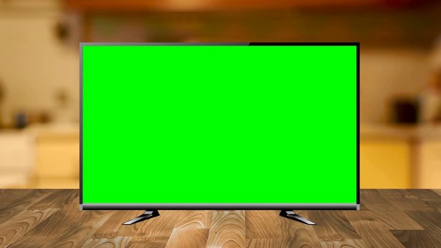 Zoom Shot of a TV with Horizontal Green Screen Mock Up
