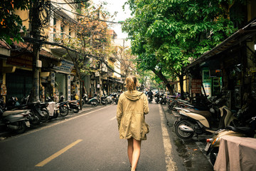 woman walking on the street in vietnam hanoi