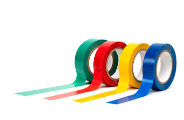 Rolls of insulation adhesive tape, multi colored ribbons on a white background.