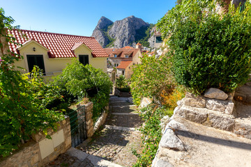 Old street in Omis city on a sunny day.