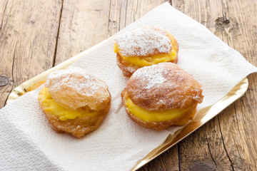 Handmade krapfen filled with pastry cream