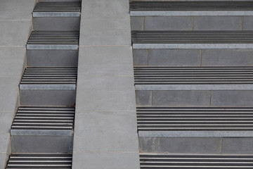 Stairs with stairnosing, rubber granulate covering and entrance slip road