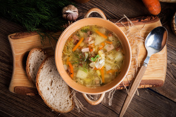 Pea soup with vegetables and bacon.