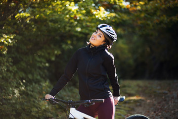 Female cyclist enjoying in a ride