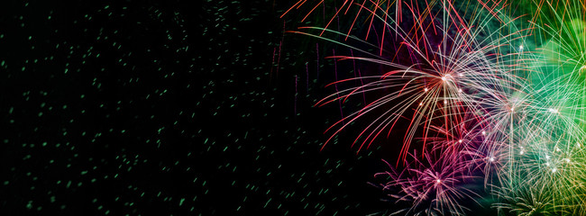 Fireworks, colorful sylvester-fireworks on black background with sparks