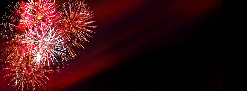 Fireworks, colorful sylvester-fireworks on black background with coloured accent