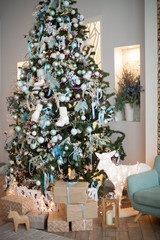 Beautiful holiday decorated room with Christmas tree