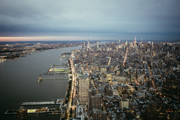 aerial view of newyork city at night - obrazy, fototapety, plakaty