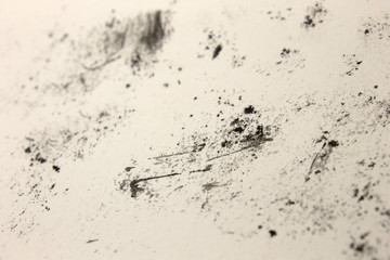 This is a photograph of a background created by applying Black marks onto a White paper using crayons