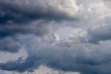The sky and the clouds are gray.
